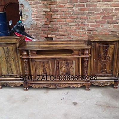 Kệ tivi gỗ tràm kệ cột nho phun pu vân mun giá thật