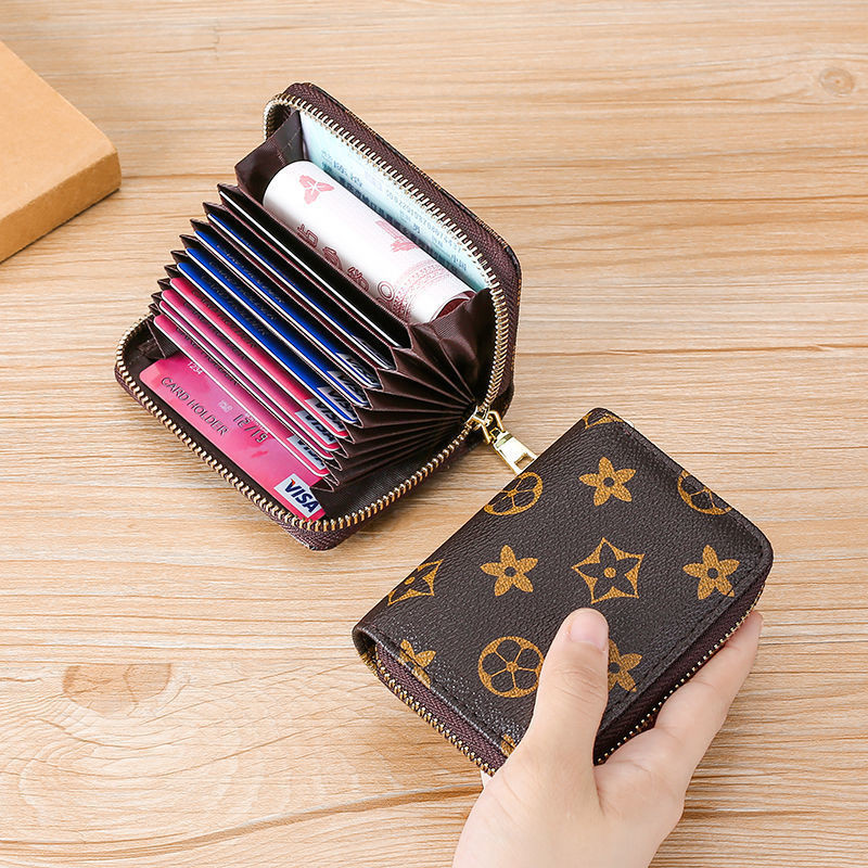 Ví da ngắn mini cầm tay nữ nhiều ngăn da PU cao cấp, chất da mềm mịn .dùng đựng thẻ , giấy tờ xe , đựng tiền nhỏ gọn và tiện lợi phong cách nữ tính, trẻ trung , hiện đại