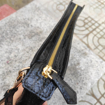 Clutch cầm tay da cá sấu 