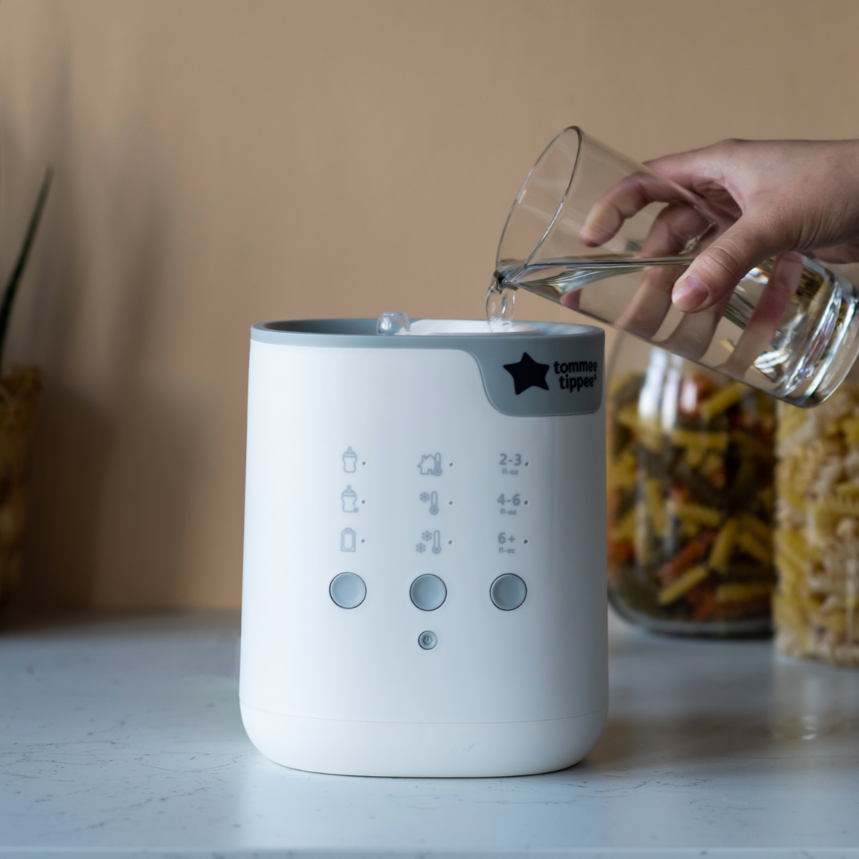 Máy rã đông, hâm nóng bình sữa và túi trữ sữa Tommee Tippee All-in-One