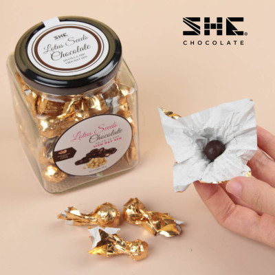 Socola viên Hạt sen - Hũ thủy tinh 90G - SHE Chocolate - Bổ sung năng lượng, đa dạng vị giác. Quà tặng sức khỏe, quà tặng người thân, dịp lễ, thích hợp ăn vặt