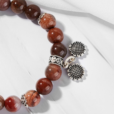 Vòng gỗ hóa thạch phối charm hoa hướng dương bạc Ngọc Quý Gemstones