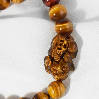 Vòng tay đá thạch anh mắt hổ vàng nâu phối tý hưu Ngọc Quý Gemstone