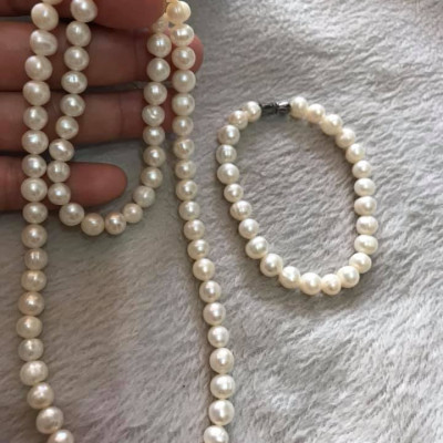 CẢ BỘ VÒNG TAY VÀ DÂY CHUỖI CHẤT LIỆU NGỌC TRAI  SIZE HƠN 7MM 